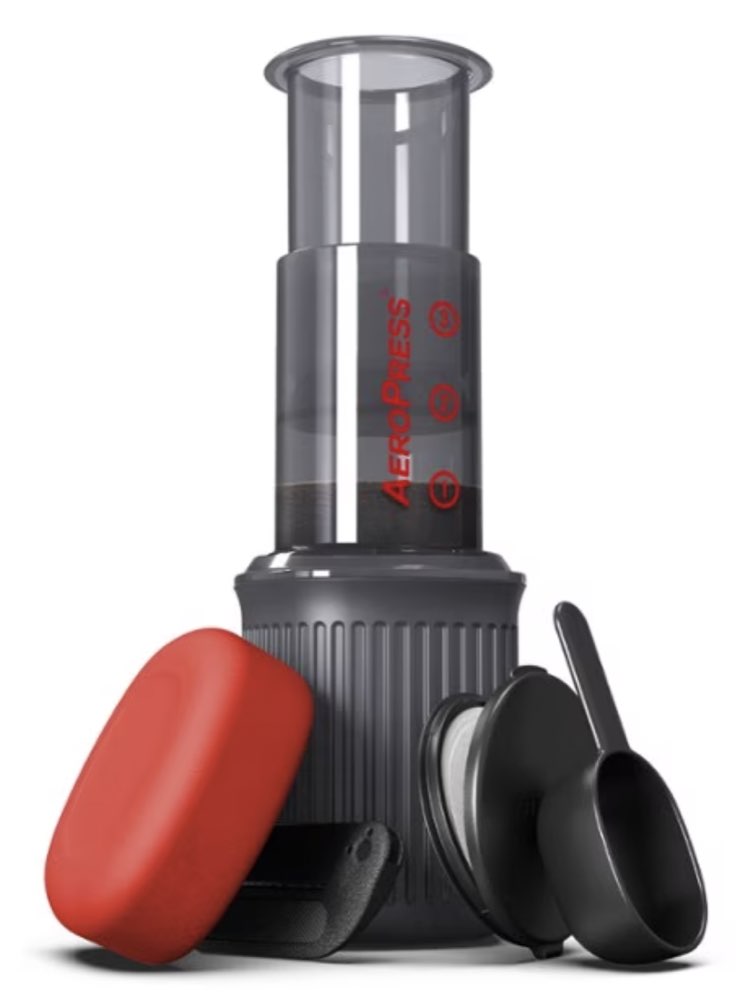 An AeroPress Go compact travel coffee press.