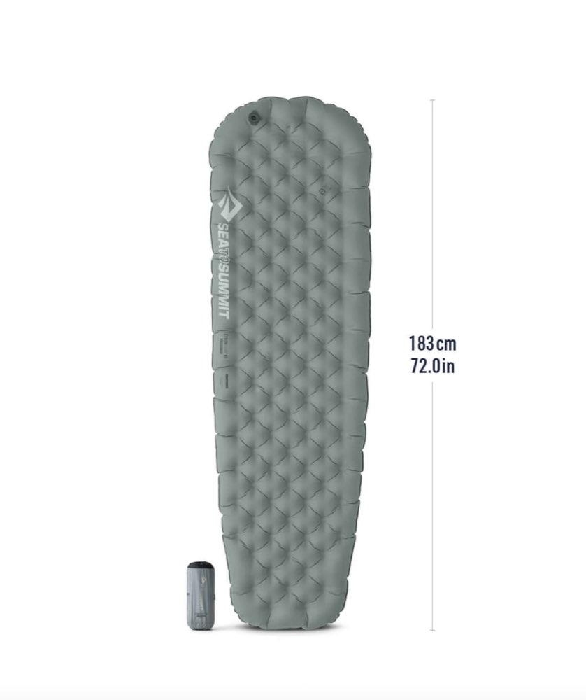 A rolled ultralight insulated backpacking sleeping pad.