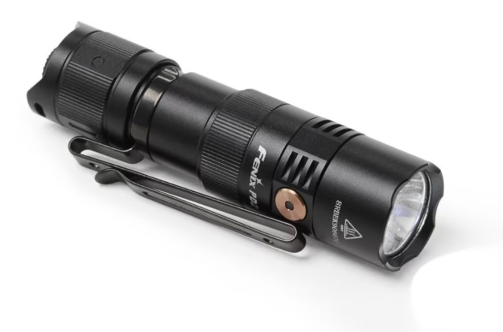A Fenix PD25R rechargeable flashlight.