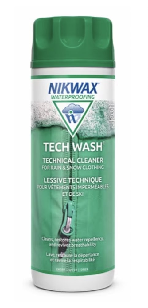 A bottle of Nikwax Tech Wash gear cleaner.
