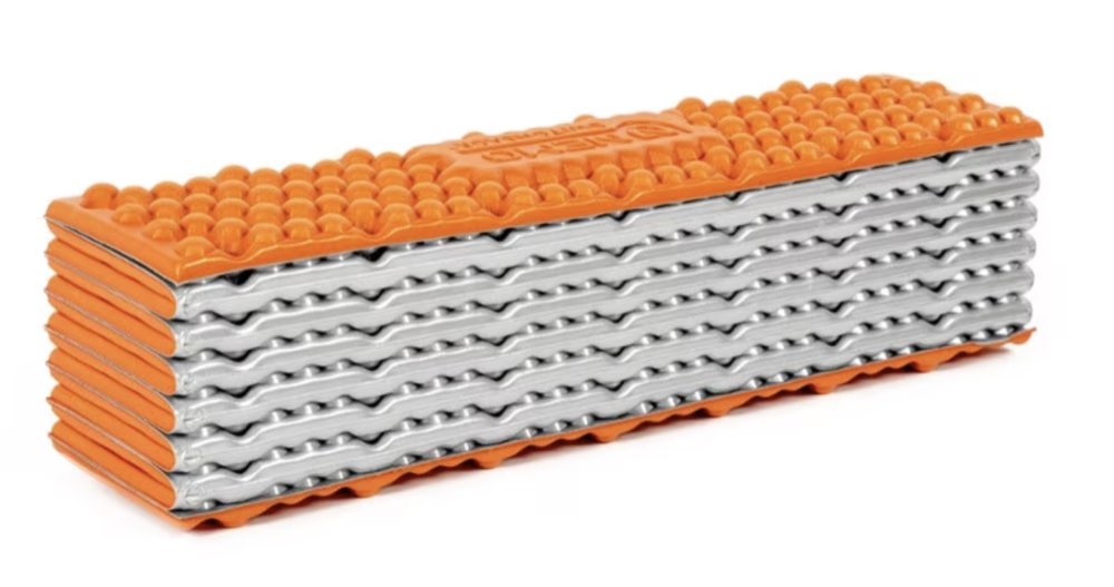 A folded NEMO Switchback foam sleeping pad, short length.