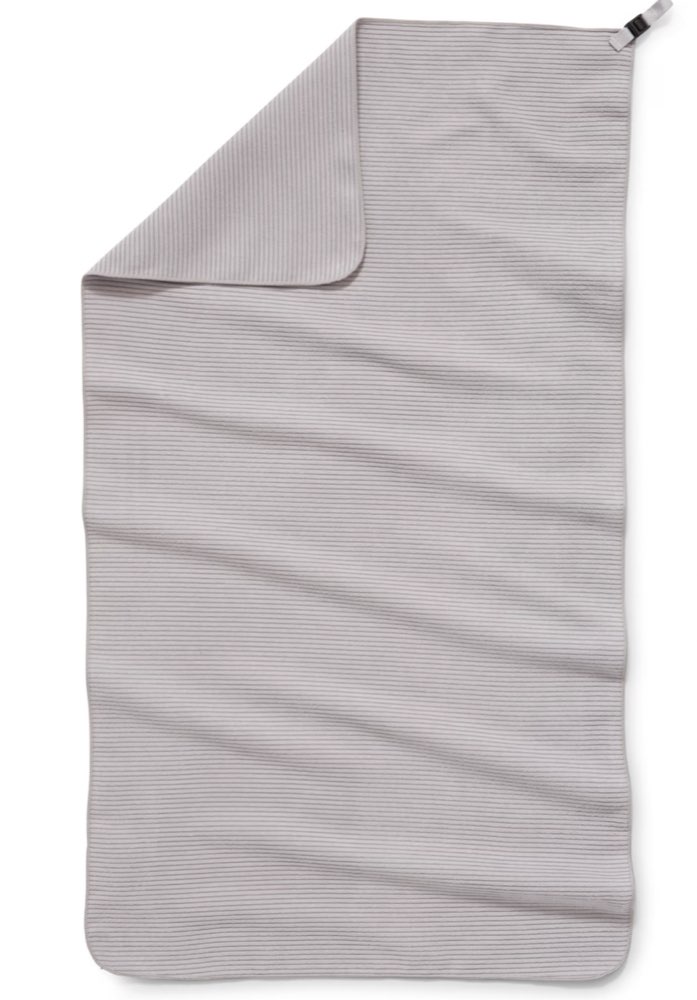A rolled REI Co-op Multi Towel Lite.