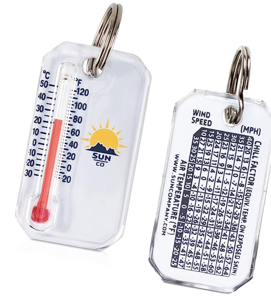 A mini keychain thermometer with a windchill chart on the back.